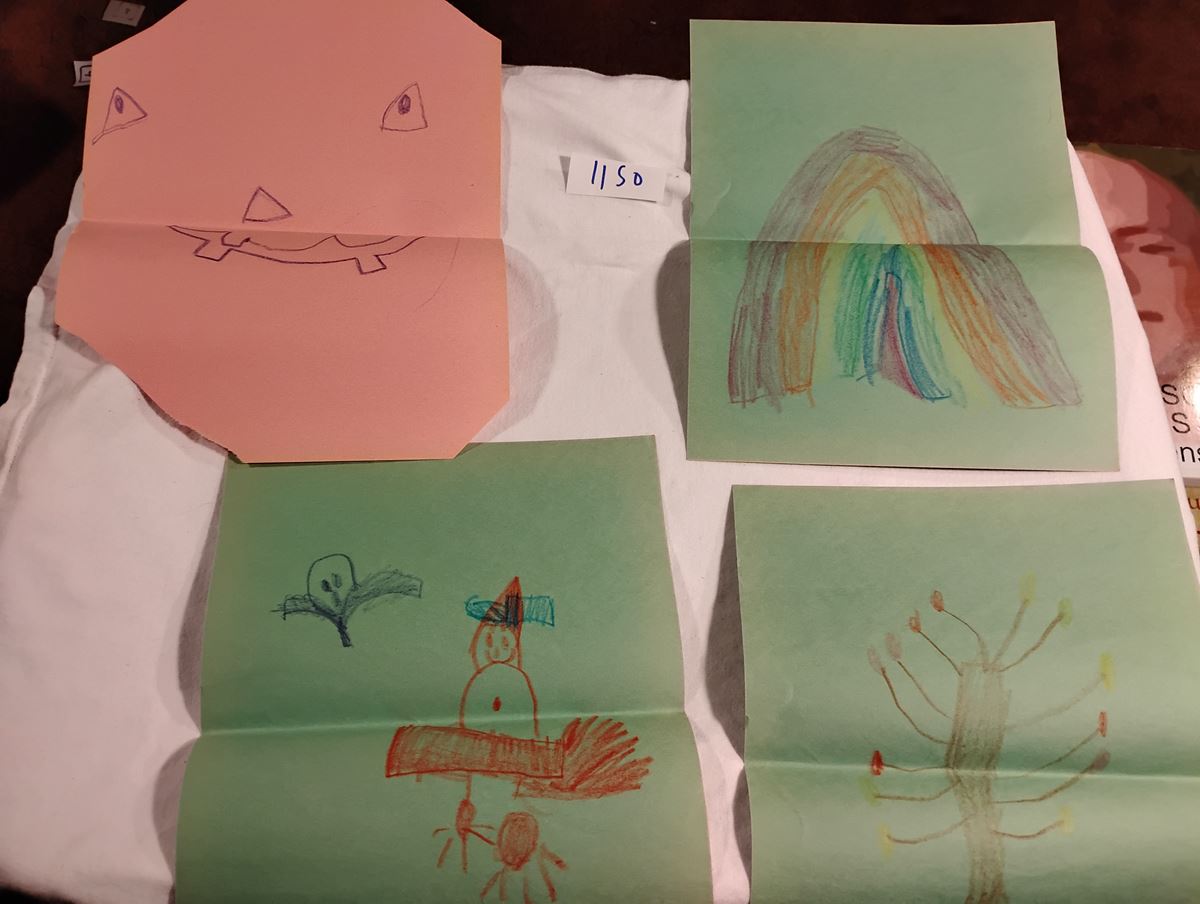 Item 1150 — FOUR CRAYON DRAWINGS: PUMPKIN FACE, RAINBOW, TREE, BIRD, picture 1 of 5