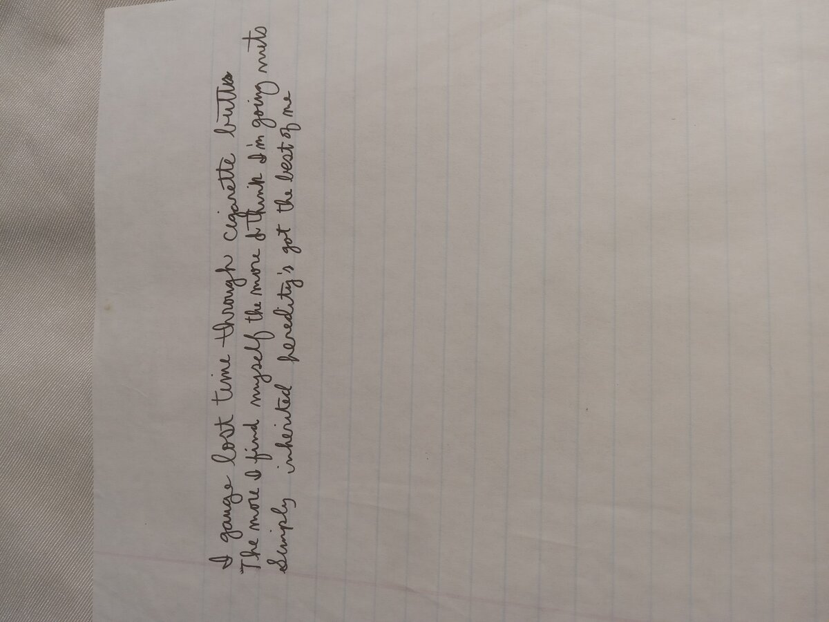 Item 1057 — I gauge lost time through cigarette butts, picture 2 of 2