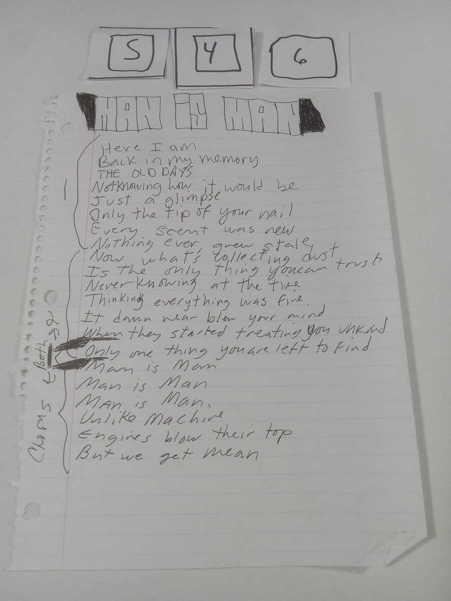 Item 546 — MAN IS MAN, picture 1 of 2