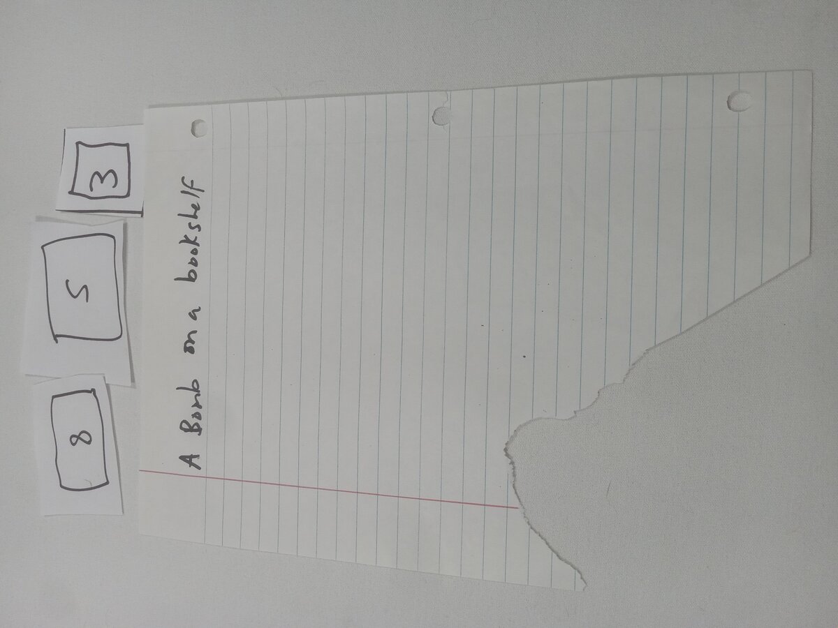 Item 853 — A Bomb on a bookshelf, picture 1 of 1