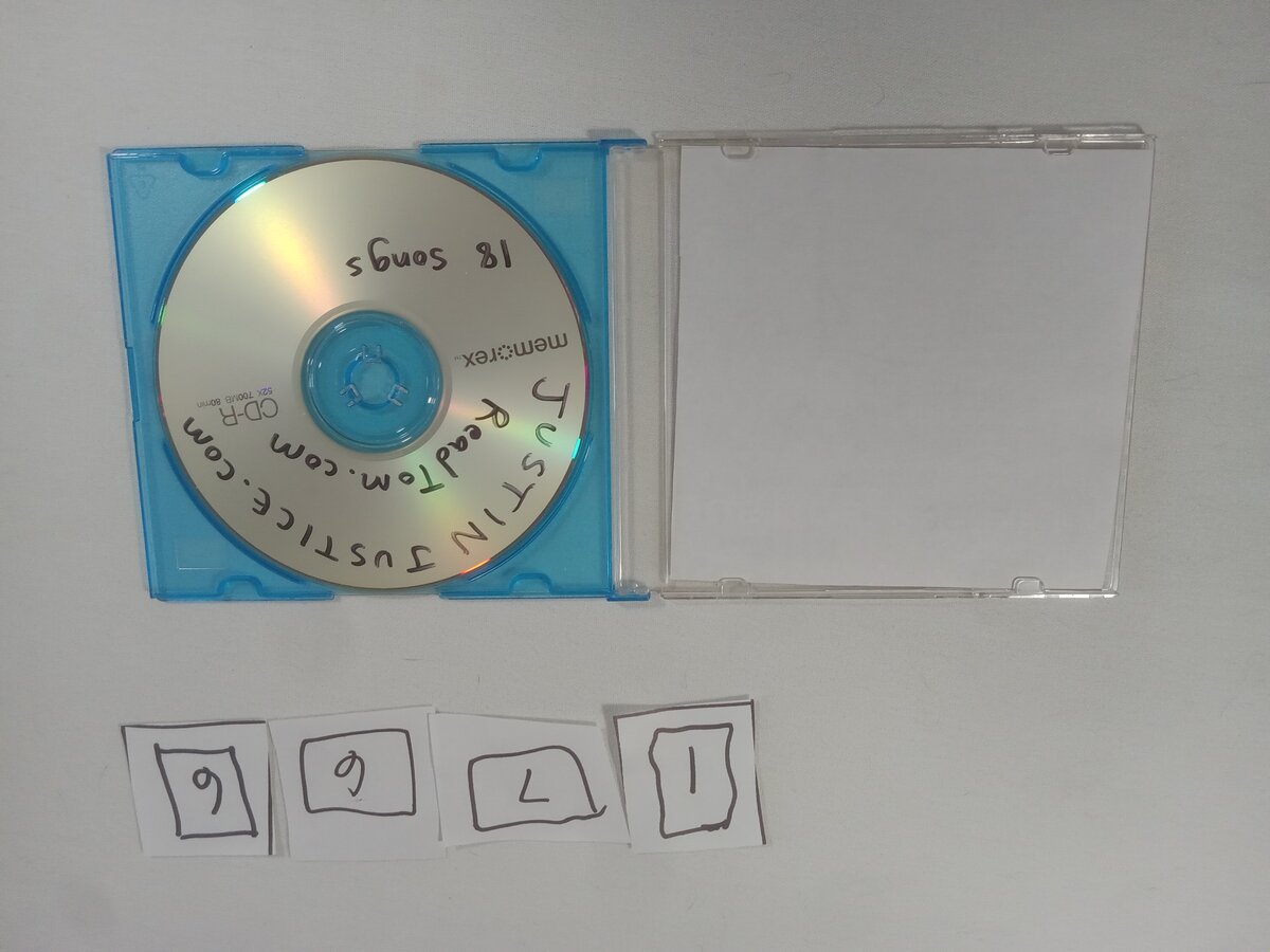 Item 1766 — JUSTIN JUSTICE 18 SONGS DISC, picture 2 of 2