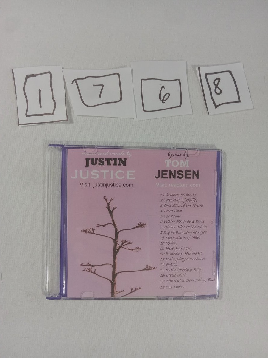 Item 1768 — JUSTIN JUSTICE 18 SONGS DISC, picture 1 of 2